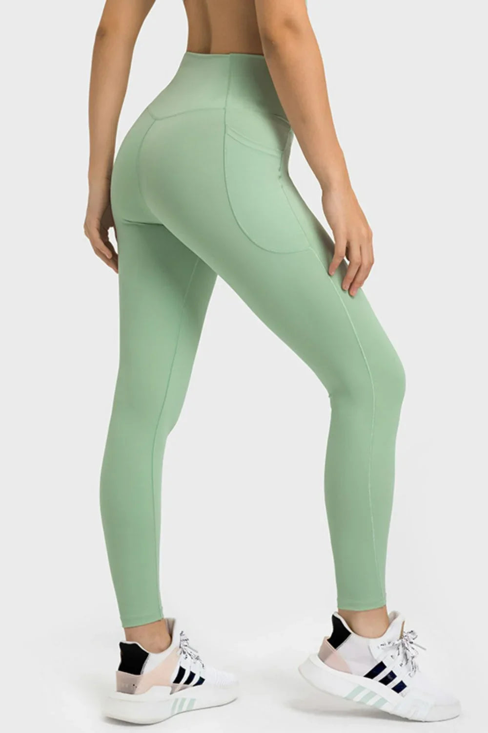 Side view of V-sculpt leggings showing high waist band and contour design