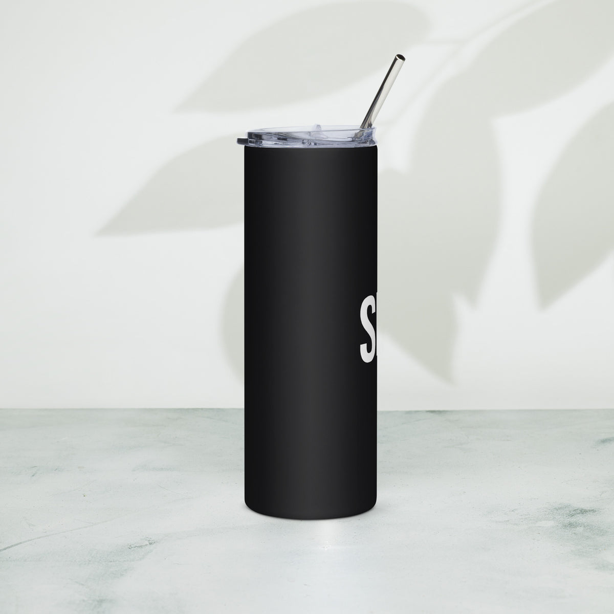 Stainless tumbler in car cupholder for moms on the go